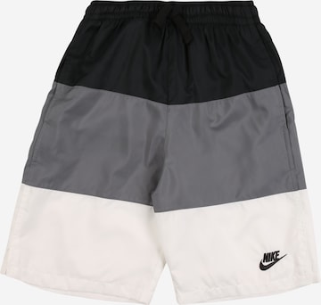 Nike Sportswear Loose fit Trousers in Black: front