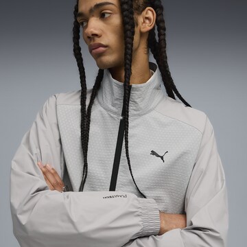PUMA Sportsweatshirt 'Pumatech' in Grijs
