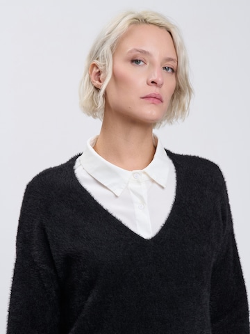 Influencer - Jersey en negro