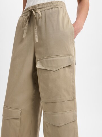 Marie Lund Flared Hose ' ' in Braun