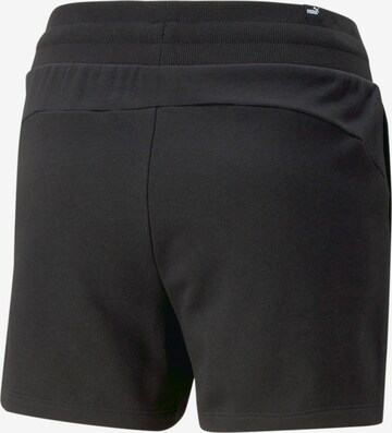 Regular Pantaloni sport 'FLOWER POWER 4"' de la PUMA pe negru