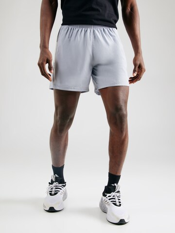 ADIDAS PERFORMANCE - Regular Calças de desporto 'Own The Run' em cinzento: frente