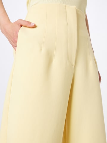 Wide leg Pantaloni di Warehouse in giallo