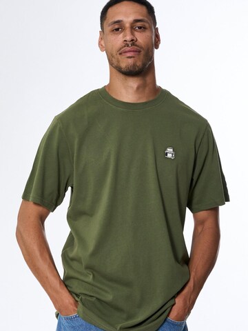 A Question Of (AQO) Shirt 'Logo Tee' in Grün