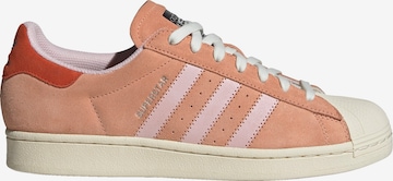 oranžinė ADIDAS ORIGINALS Sportbačiai be auliuko 'Superstar'