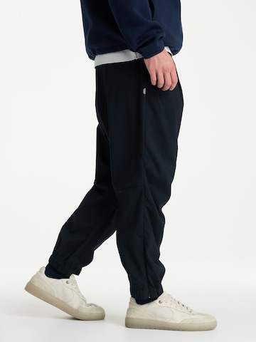 CHASIN' Loosefit Bandplooibroek 'Nyro Sync' in Blauw