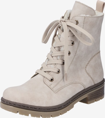 Bottines à lacets Rieker en beige : devant