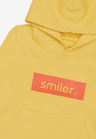 Sweat smiler. en jaune