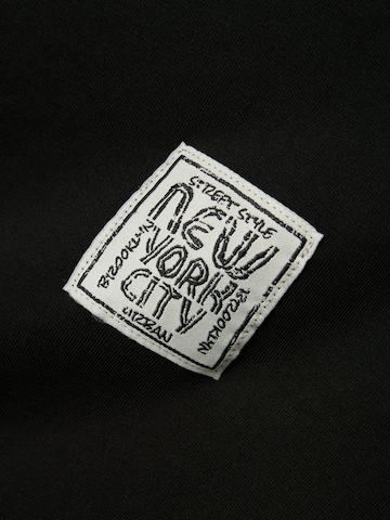 NAME IT Koszulka 'NKMVARTO' w kolorze czarny