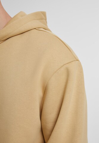 Sweat-shirt 'Fluffy' Urban Classics en beige