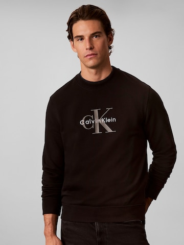Calvin Klein Jeans Sweatshirt in Zwart: voorkant
