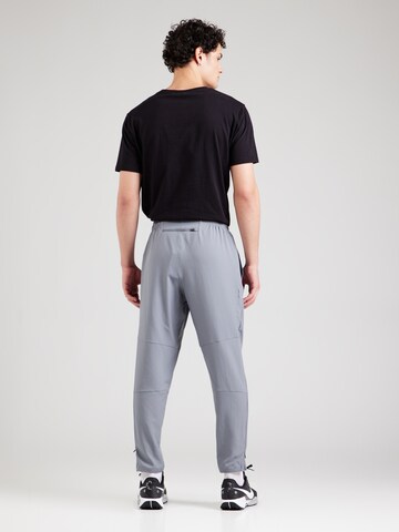 NIKE Tapered Sports trousers 'CHALLENGER' in Grey