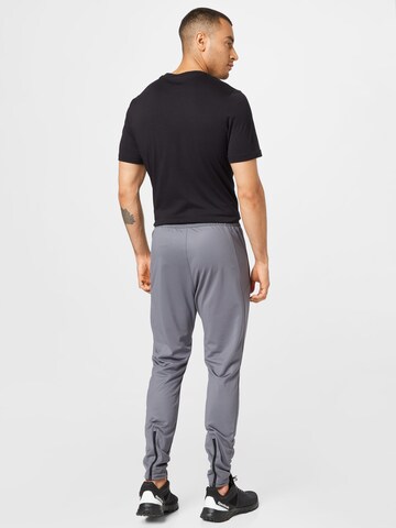 Reebok Zúžený Sportovní kalhoty – šedá