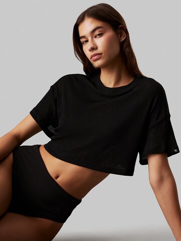 T-shirt Calvin Klein Swimwear en noir : devant