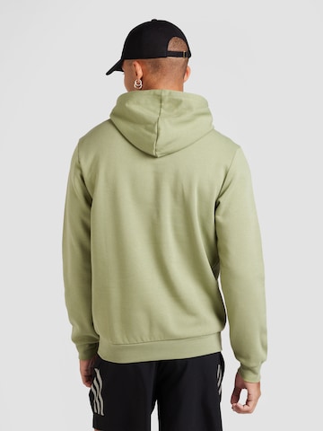 ADIDAS SPORTSWEAR Sports sweatshirt 'FEELCOZY' in Green