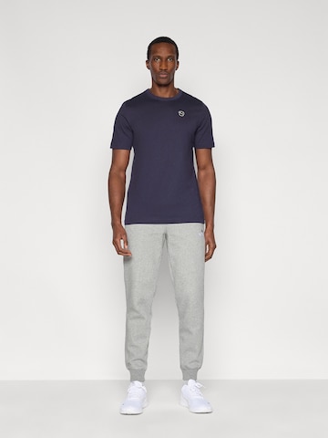 Tricou 'ESS' de la PUMA pe albastru