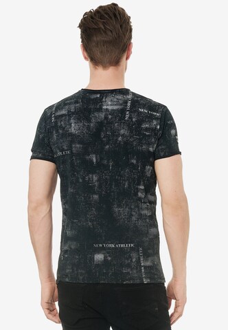 Rusty Neal T-Shirt mit lässigem Print in Schwarz