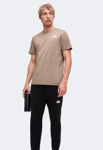 Tapered Pantaloni per outdoor 'MOUNTAIN ATHLETICS 2.0' di THE NORTH FACE in nero