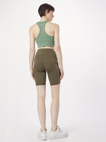 Skinny Pantaloni sportivi 'W ALPINE ACTIVE SHORT' di super.natural in grigio