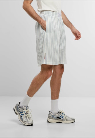 Another Cotton Lab - Loosefit Pantalón en azul