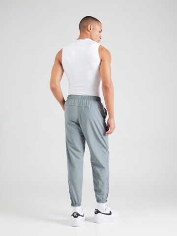 NIKE Tapered Workout Pants 'FORM' in Grey