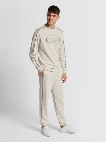 Hummel Regular Trousers 'Ryan' in Beige