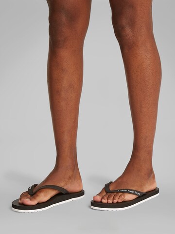 Calvin Klein Jeans Teenslippers 'THONG+' in Zwart