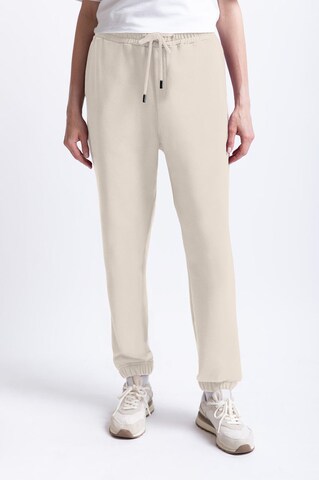 UNIQVIBE Tapered Hose in Beige: Vorderseite