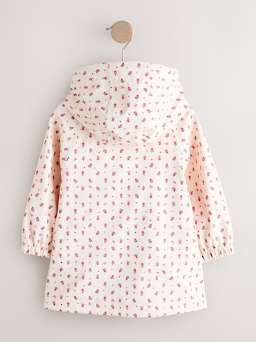 Palton de la Next pe bej