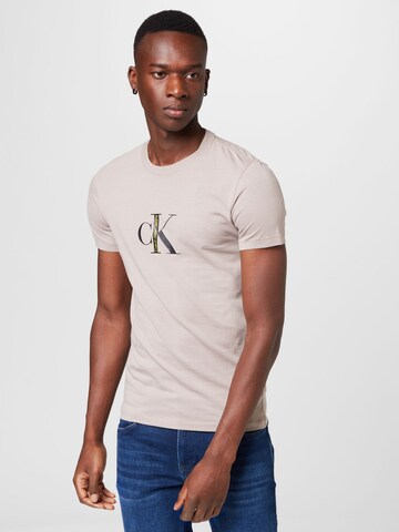 Calvin Klein Jeans Koszulka w kolorze beżowy: przód