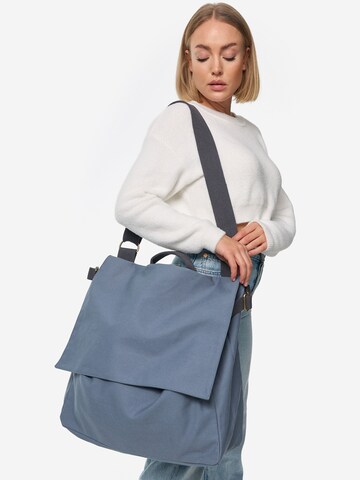 The Organic Company Crossbody Bag in Blue: front