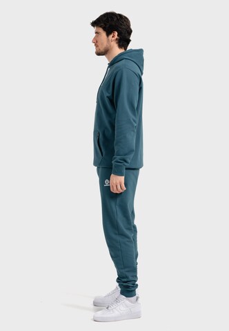 Oldskull Tapered Pants 'Basic Oldskull 25 Logo' in Blue