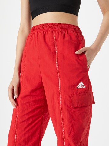 ADIDAS SPORTSWEAR Zwężany krój Spodnie sportowe 'Dance Versatile ' w kolorze czerwony