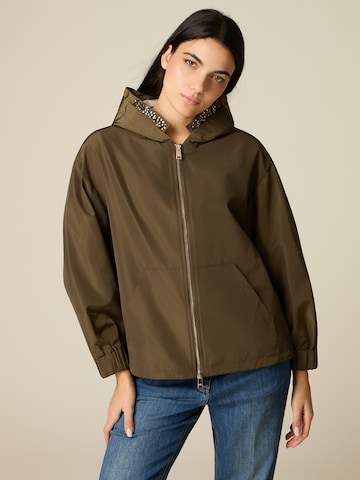 Cappotto invernale di oltre in verde