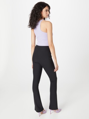 évasé Pantalon River Island en noir