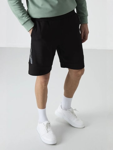 Regular Pantalon Tommy Life en noir