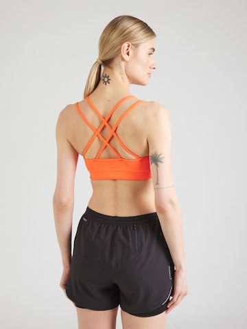 Bustino Reggiseno sportivo 'Puma x Hyrox Move' di PUMA in rosso