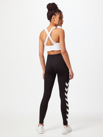 Skinny Pantaloni sportivi di Hummel in nero