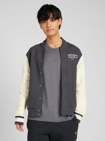 Nike Sportswear Between-season jacket 'VARSITY' in Grey: front