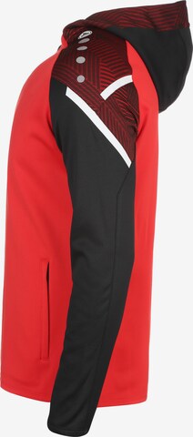 Veste de survêtement JAKO en rouge