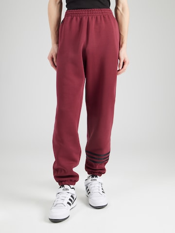 Tapered Pantaloni 'Neuclassics' di ADIDAS ORIGINALS in rosso: frontale