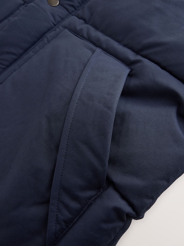 Next - Chaleco en azul