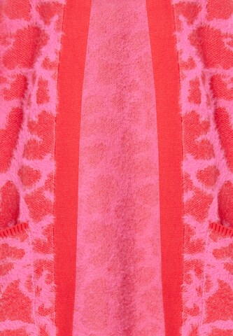 Cardigan swirly en rose