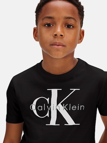 Calvin Klein Kids - Camiseta 'CK MONO LOGO SS T-SHIRT' en negro