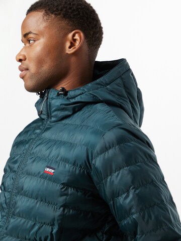 LEVI'S ® Övergångsjacka 'Presidio Pkbl Hooded Jkt' i grön