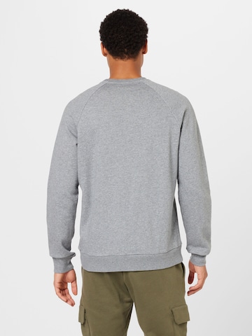 Sweat de sport 'Rival' UNDER ARMOUR en gris