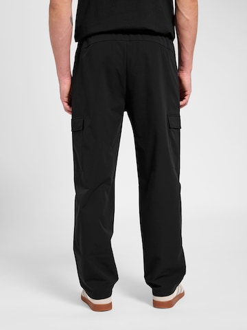 Loosefit Pantalon de sport Hummel en noir