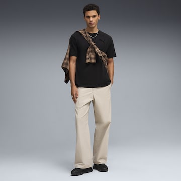 PUMA T-Shirt 'Essentials Elevated' in Schwarz