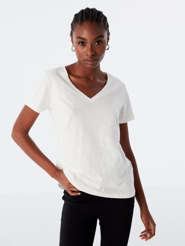 T-shirt Twist en beige : devant