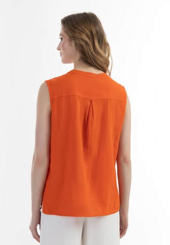 Usha - Blusa em laranja